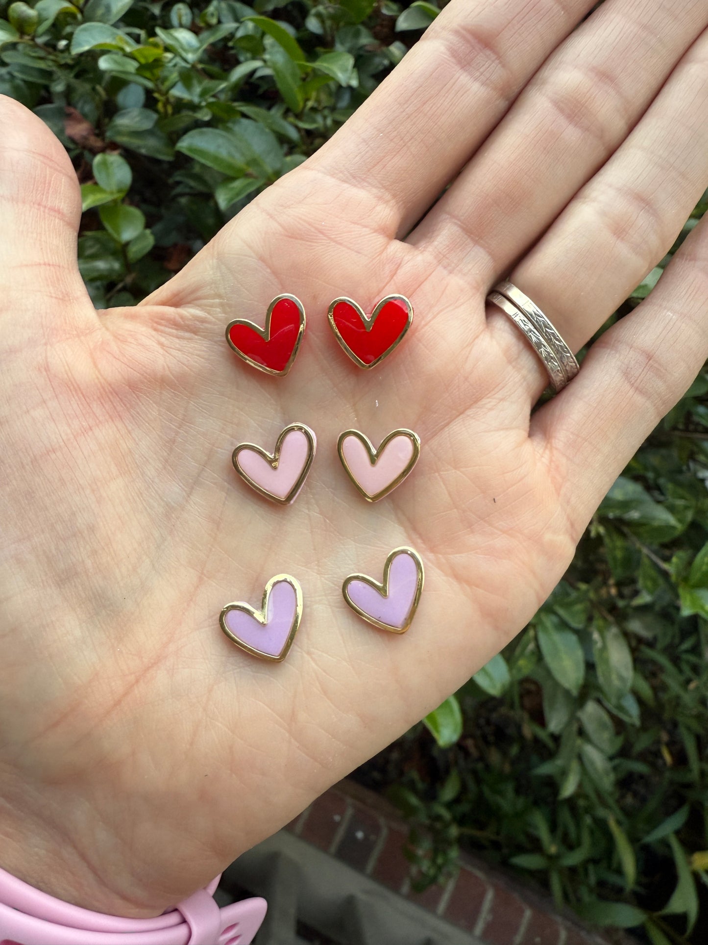 Gold framed heart studs